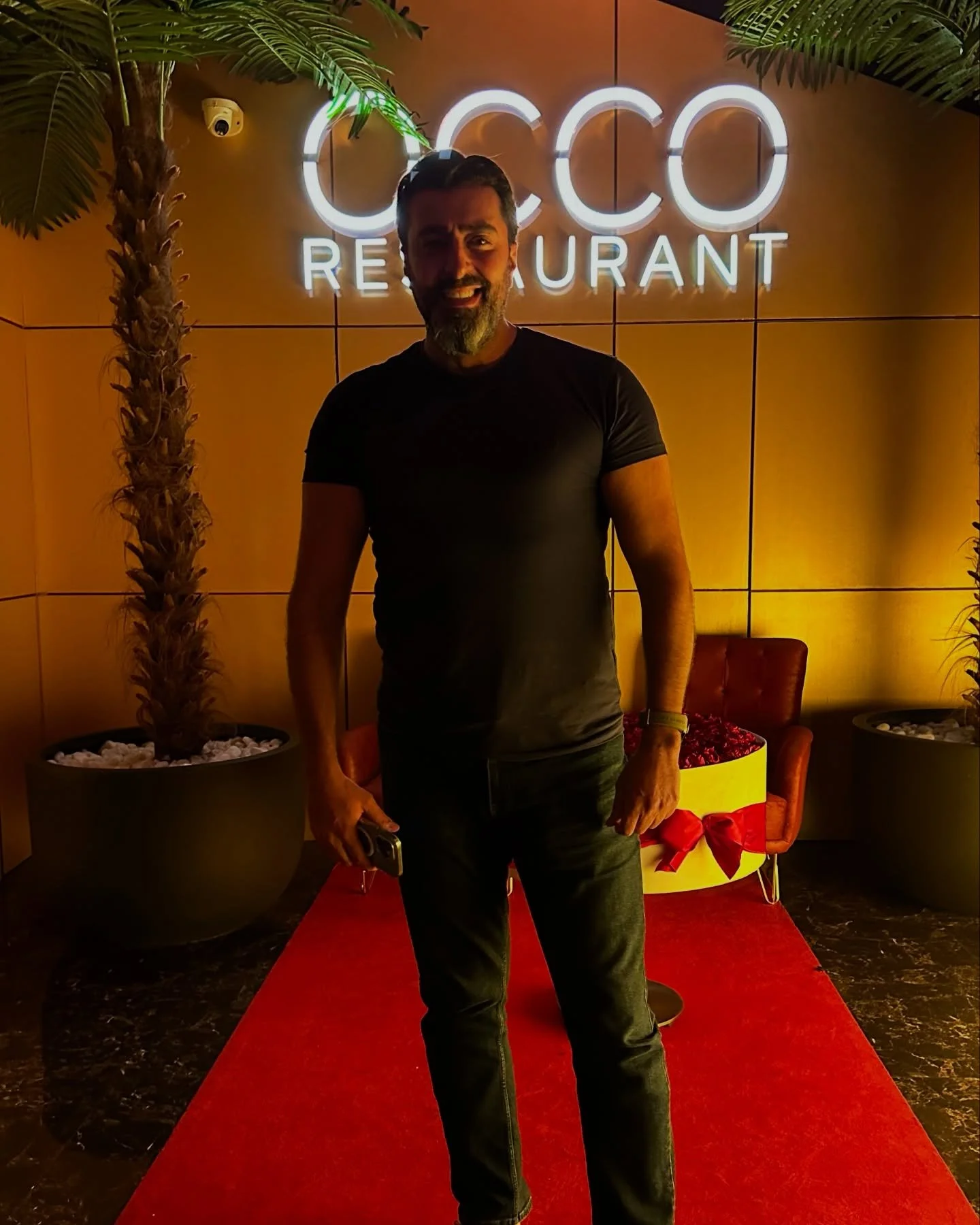 OCCO restaurant entrance with neon sign